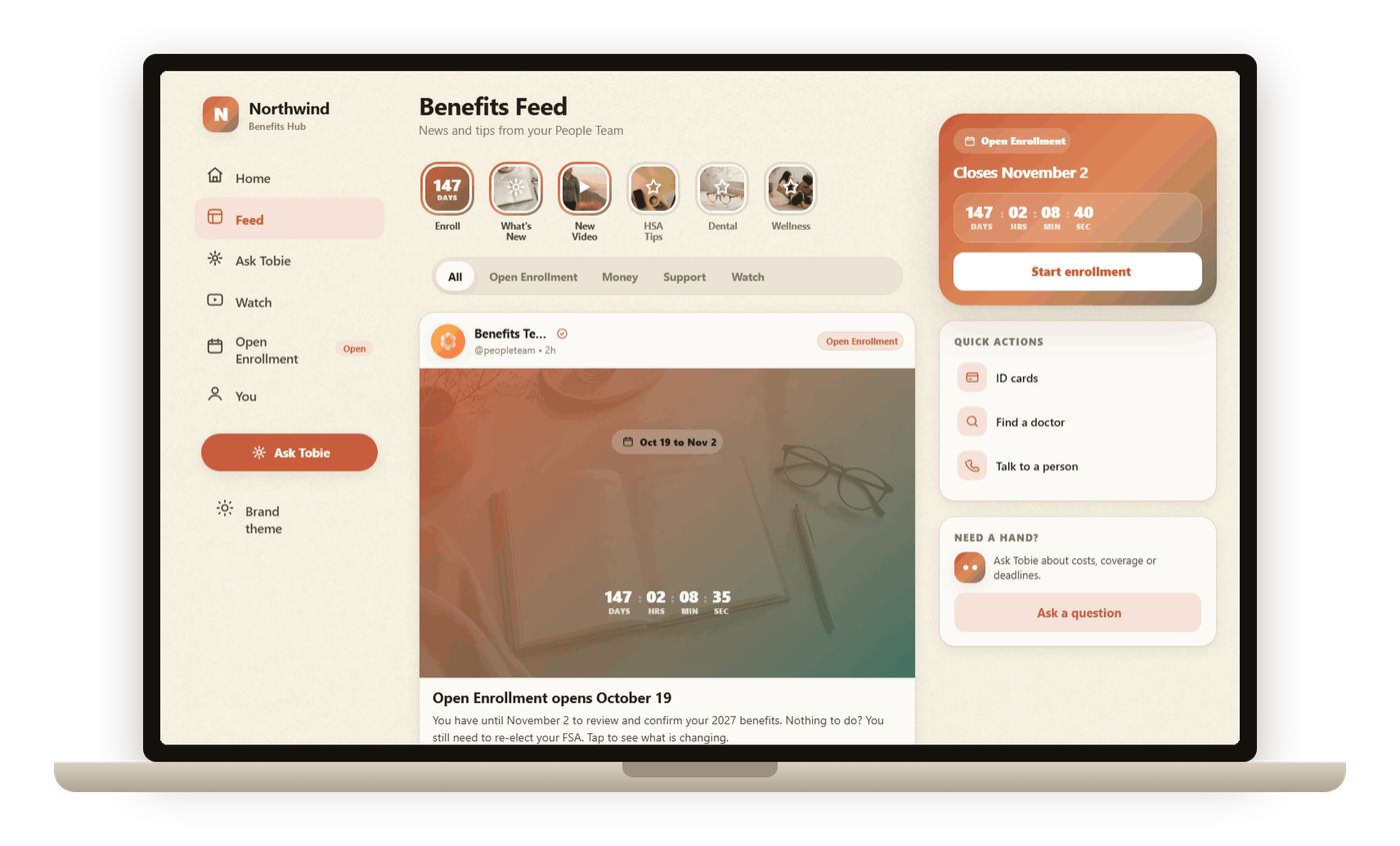 The Tobie benefits hub on a laptop: a branded feed, open-enrollment countdown, and quick actions